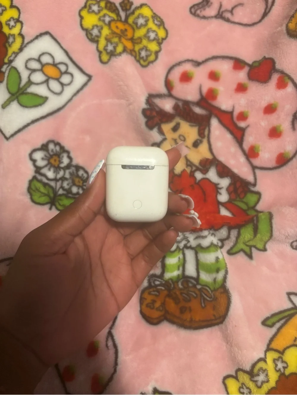 Apple White Wireless Earbud Charging Case on Pink Character Print